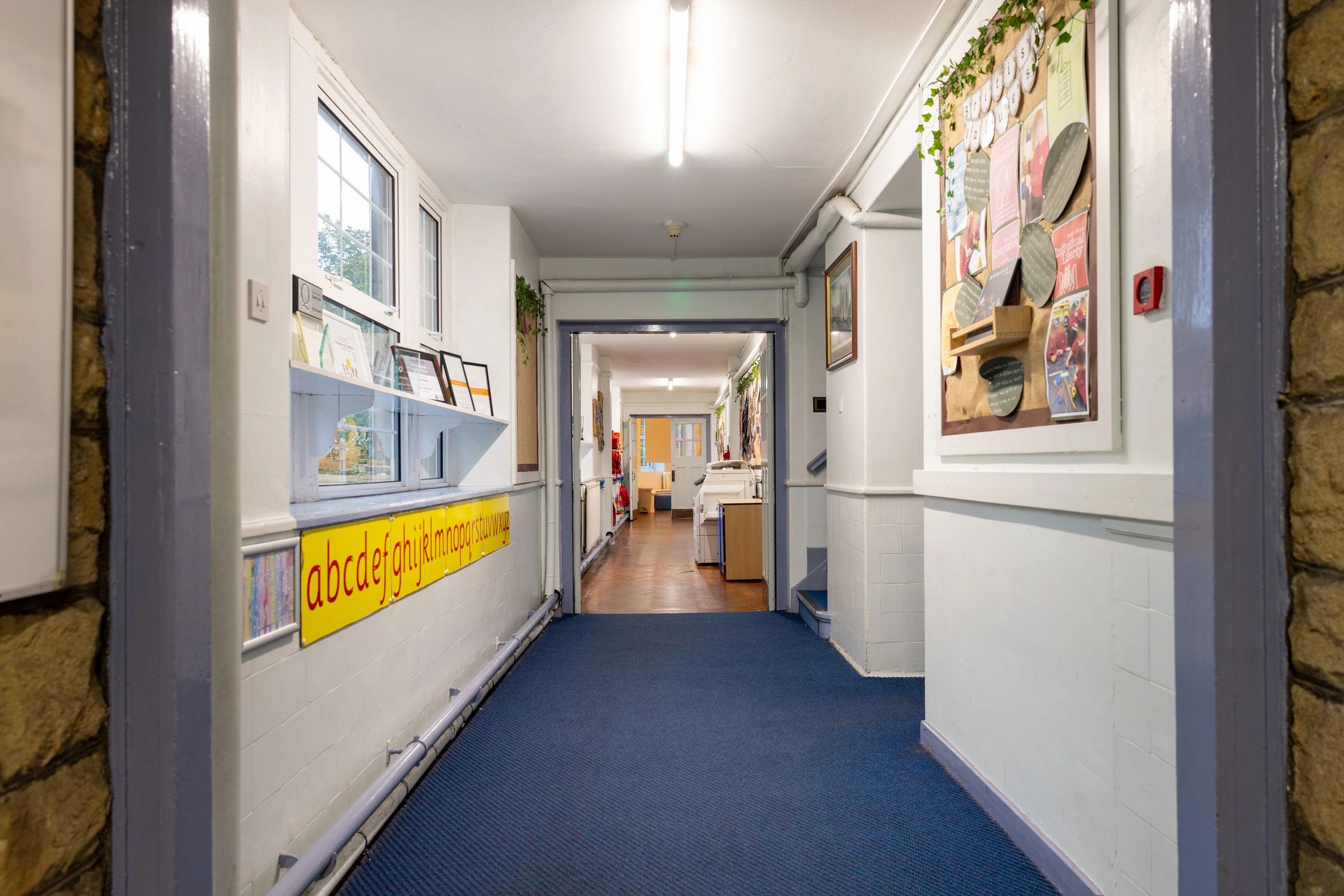 Clean, well-lit corridor in a commercial facility
